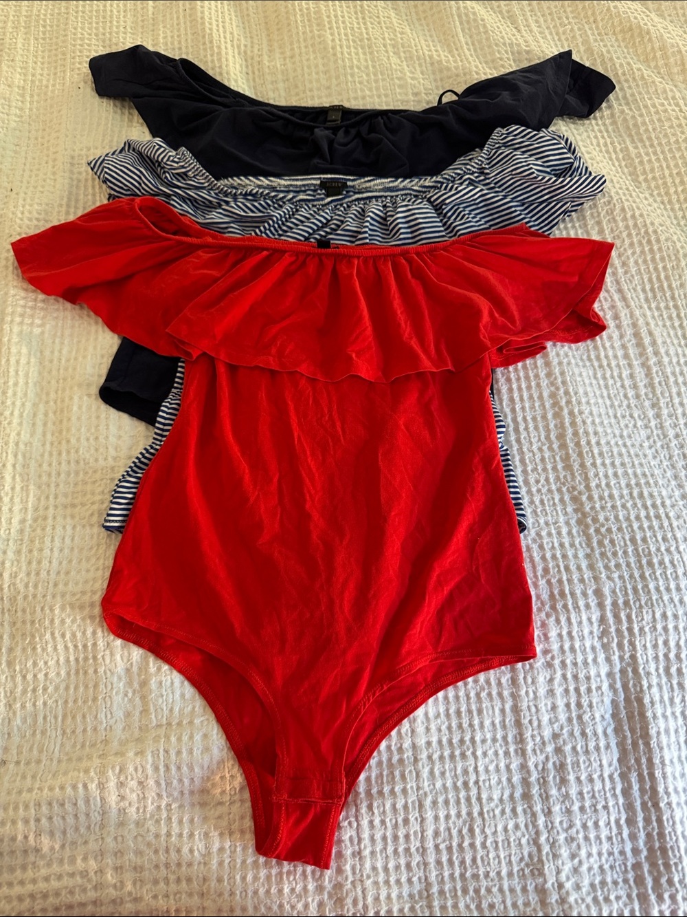 J. Crew Bundle of three Off-Shoulder Ruffle One-Piece Bodysuits.